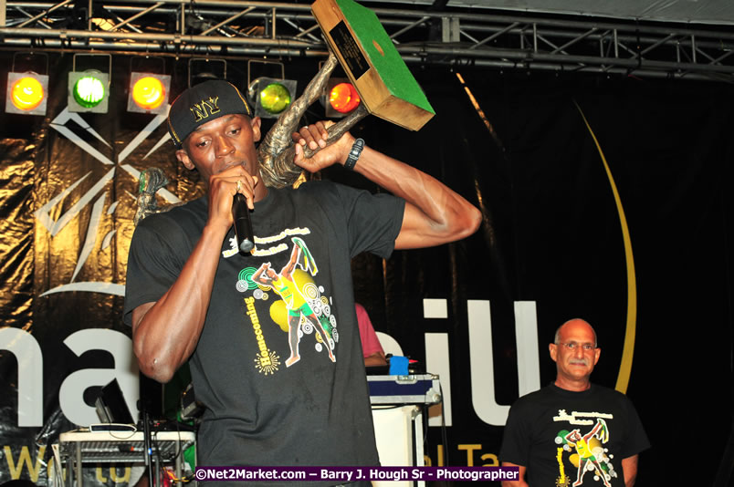 Usain Bolt of Jamaica - The Fastest Man In The World  - Usain Bolt Homecoming Celebrations Concert at the William Knibb High School Play Field, Trelawny - Ice, Ding Dong, Ravers Clavers, D'Angel, Voicemail, RDX and Dancers, Wayne Marshall, Tammi Chynn, Bugle, Nero, Tanya Stephens, Richie Spice, Kip Rich,and Shaggy - Photographs by Net2Market.com - Barry J. Hough Sr. Photojournalist/Photograper - Photographs taken with a Nikon D300 - Negril Travel Guide, Negril Jamaica WI - http://www.negriltravelguide.com - info@negriltravelguide.com...!